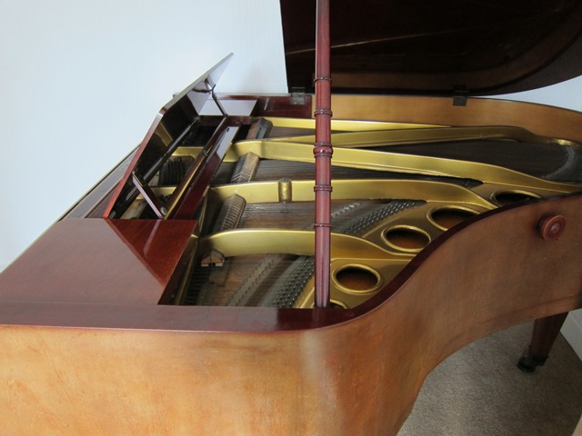 Bosendorfer grand piano in walnut, case lid opened